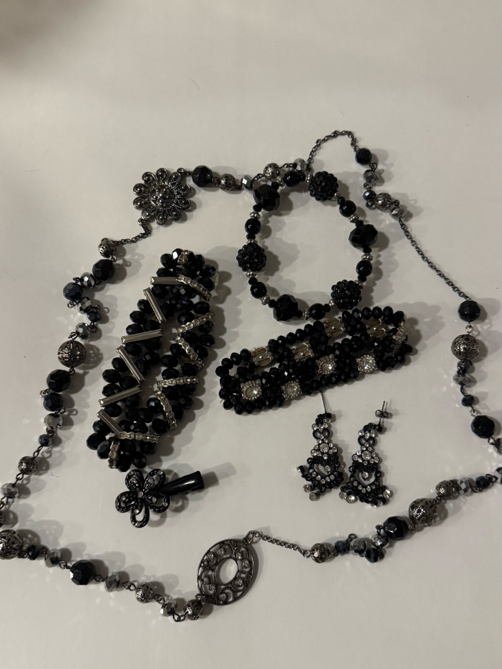 Elegant Black Crystal necklace, 3 bracelets, earrings, and hair clip combo.